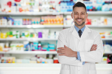 Professional pharmacist in modern drugstore, space for text