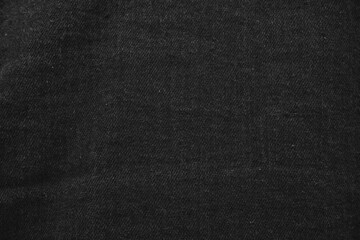 Fototapeta premium Close up of black jeans jacket fabric.