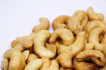 Close up of cashew nuts with white backgorund.