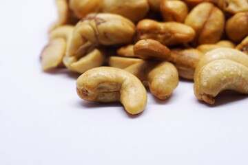 Close up of cashew nuts with white backgorund.