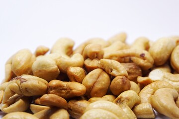 Close up of cashew nuts with white backgorund.
