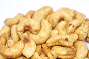 Close up of cashew nuts with white backgorund.
