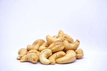 Close up of cashew nuts with white backgorund.