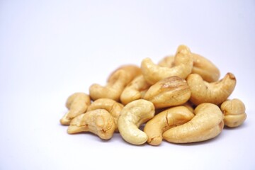 Close up of cashew nuts with white backgorund.