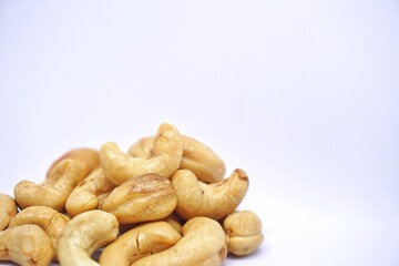 Close up of cashew nuts with white backgorund.