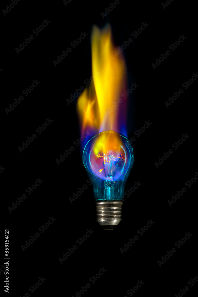 Wall mural light bulb in fire