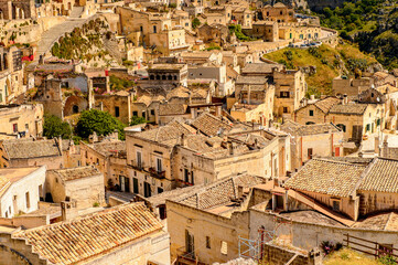 Fototapeta na wymiar It's Panorama of Matera, Puglia, Italy. The Sassi and the Park of the Rupestrian Churches of Matera. UNESCO World Heritage site