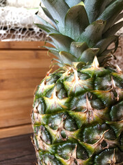 Fototapeta premium pineapple on a wooden table