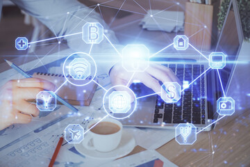 Media network theme hologram with man working on computer on background. Concept of internet communication. Double exposure.