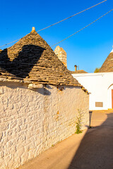 It's Alberobello, a small town in Apulia, Italy. Famous for its unique trulli buildings. The Trulli...