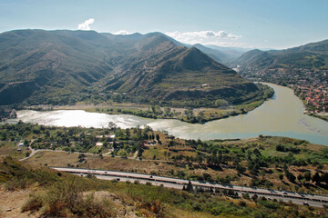 Aragvi and Kura rivers confluence near city of Mtskheta in Georgia