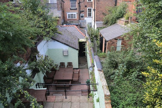 An Aerial View Over An Outdoor Eating Area In An English Back Garden.