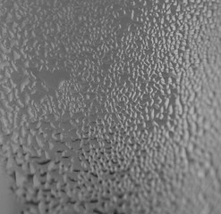 misted glass on a gray background drop