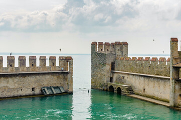 It's Wall of the Castello Scaligero di Sirmione (Sirmione Castle), built in XIV century, Lake Garda, Sirmione, Italy
