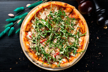 italian pizza with arugula top view, flat lay