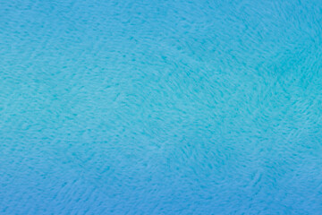 Blue plush fabric closeup background