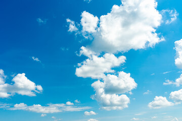 Naklejka na ściany i meble Blue sky and white clouds.Background copy space for your text notes