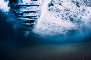 Ocean wave with vortex in underwater. Underwater view