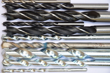 Drills of various sizes on a white background