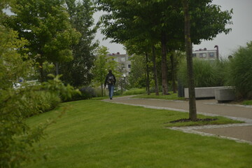 walkway through the park in the middle of the housing estate