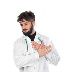 Young doctor with beard wearing a medical gown