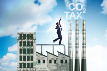 Businessman in carbon tax concept