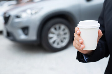 Businessmen are drinking hot coffee before leaving to work at the office every time.