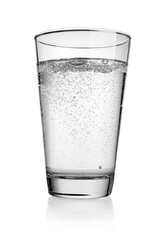 Glass of water with bubbles of gas isolated on white.