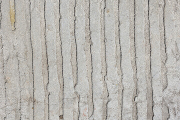 Texture of dirty concrete wall with lines or strips