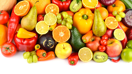 Big collection multi-colored juicy vegetables and fruits isolated on white background.