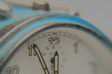 close up vintage alarm clock blue