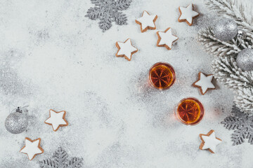 Whiskey, brandy or liquor, cookies and winter holiday decorations on white background