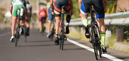 Group of cyclist at professional race, cyclists in a road race stage