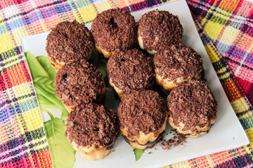 delicious cupcakes lie on a glass plate