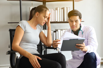 Patient woman talking with a doctor, problem healthy interview or consulting or diagnostic treatment, social distancing and virus protection