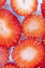 Appetizing slices of juicy strawberries.
