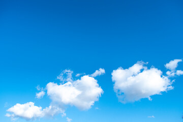 Naklejka na ściany i meble blue sky background with tiny clouds. blue sky with white clouds