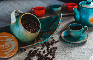 cup of tea and teapot on wooden table