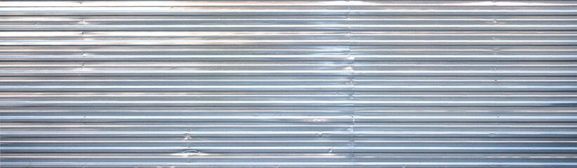 iron wall. Corrugated iron. Galvanized iron wall plate background. sheet wall panel. Sheet Metal with little light