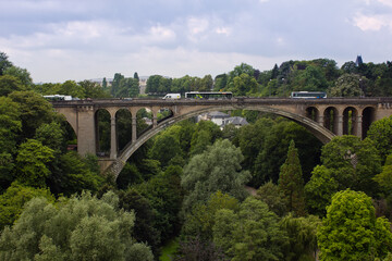 Fototapeta na wymiar Bridge of Adolf (New Bridge) connects Upper and Lower Town of Luxembourg city, Luxembourg