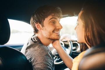 tourism - Happy young Man and woman Happy sit in a car. Travel and adventure concept.