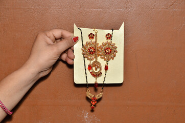 Ornaments In Hand With White Board Himachal Pradesh India