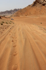 Hot and arid desert sand dunes terrain in Sharjah emirate in the United Arab Emirates. The oil-rich UAE receives less than 4 inches of rainfall a year and relies on water from desalination plants.