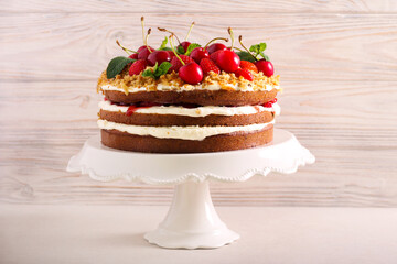 Layered cake with berries on top