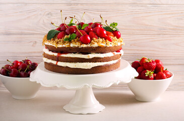 Layered cake with berries on top