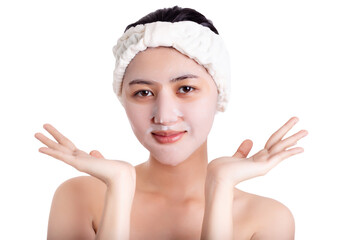 Asian young woman applying facial mask on beauty face Attractive beautiful girl use moisturizer...