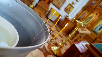 Baptismal font in a ortodoxal church for the christening of children