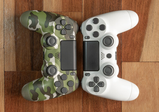 Game controller on wooden floor