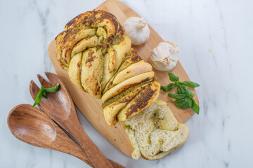 Slices of Italian pesto braided bread 