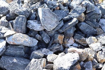 Big stone pile for construction building in construction site closeup.